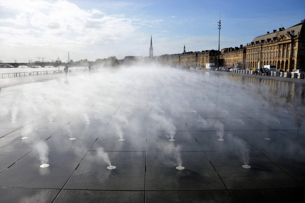 Giochi d'acqua del "Miroir d'eau" fontana, vapore