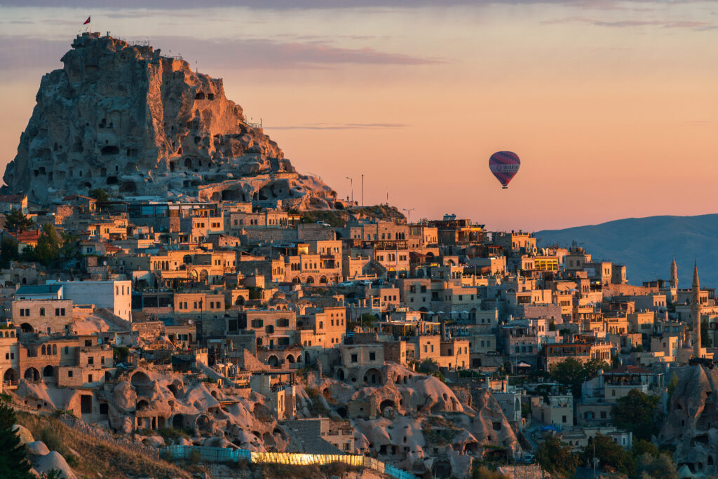 The town of Uçhisar kissed by the sun at the sunrise